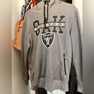 NFL raiders hoodie. grey with zipper pockets